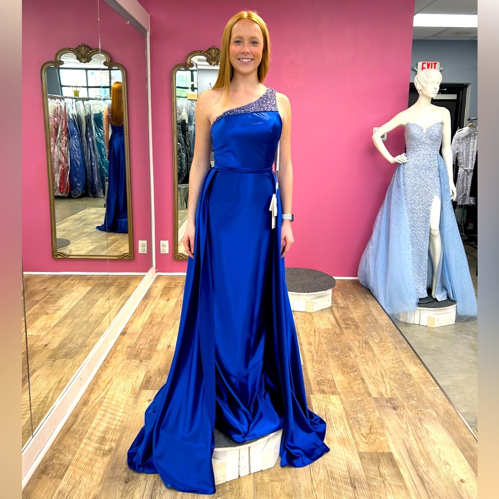 NWT size 2 Sophia Thomas, never worn. Perfect for pageants or prom!